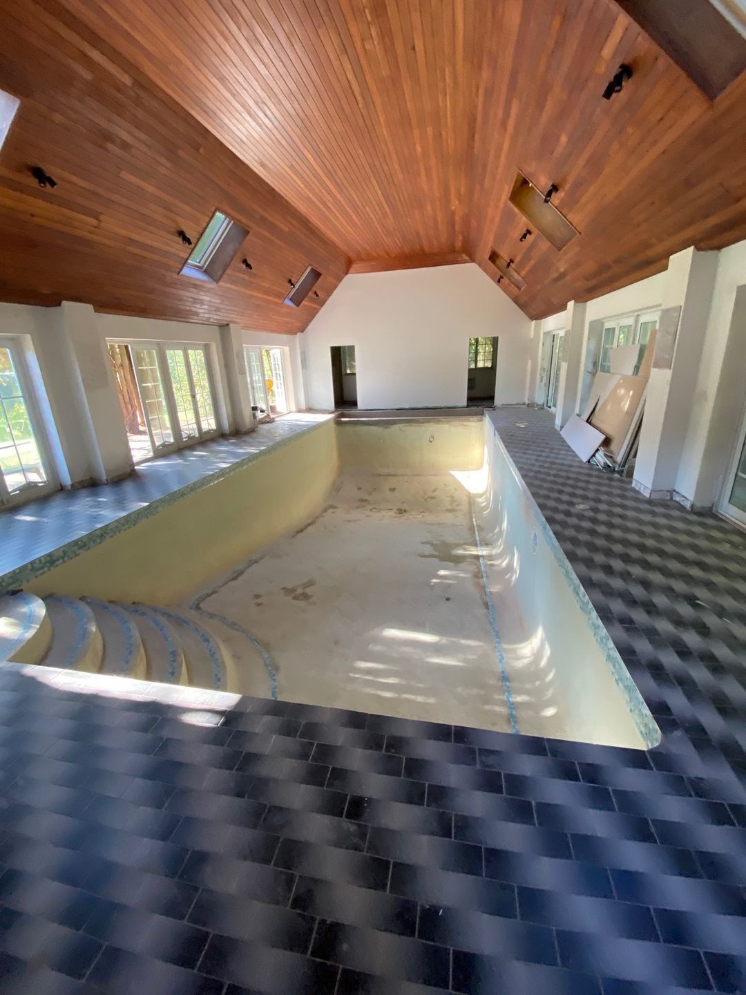 The original concrete swimming pool featured an internal Marbelite finish and tiled waterline decoration