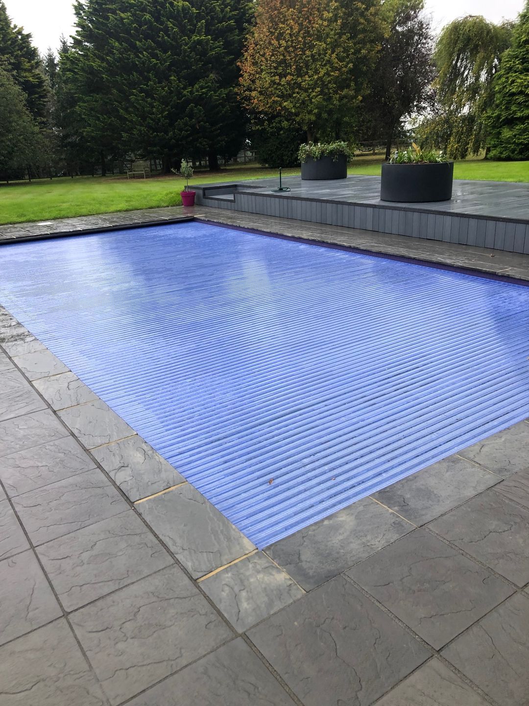 Outdoor semi automatic Pool Cover installed by UK Swimming Pools Ltd