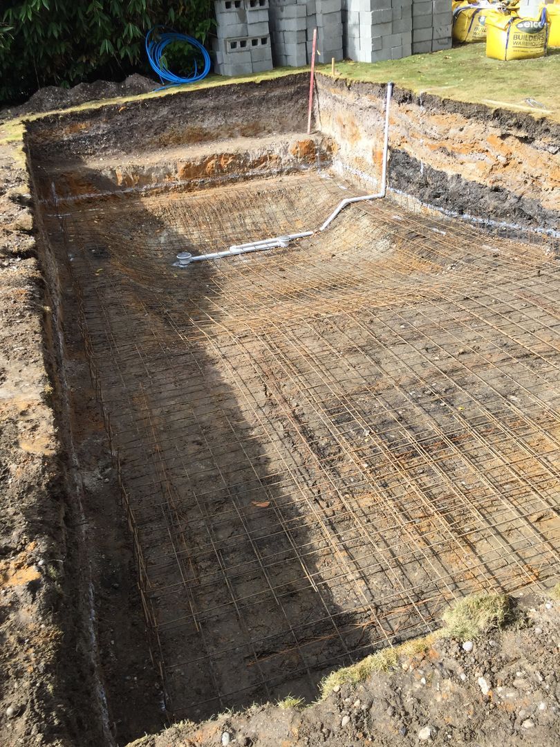 After excavating the pool, metal wireframes were laid at the bottom for added strength