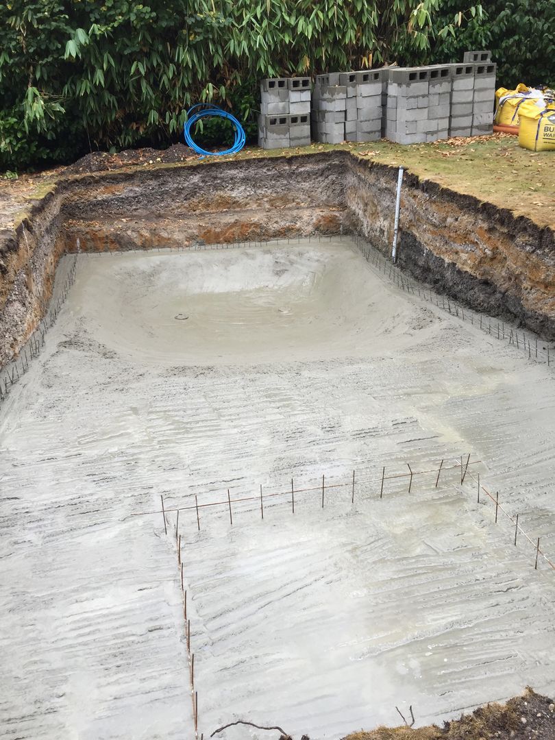 Concrete poured over the metal wire frames