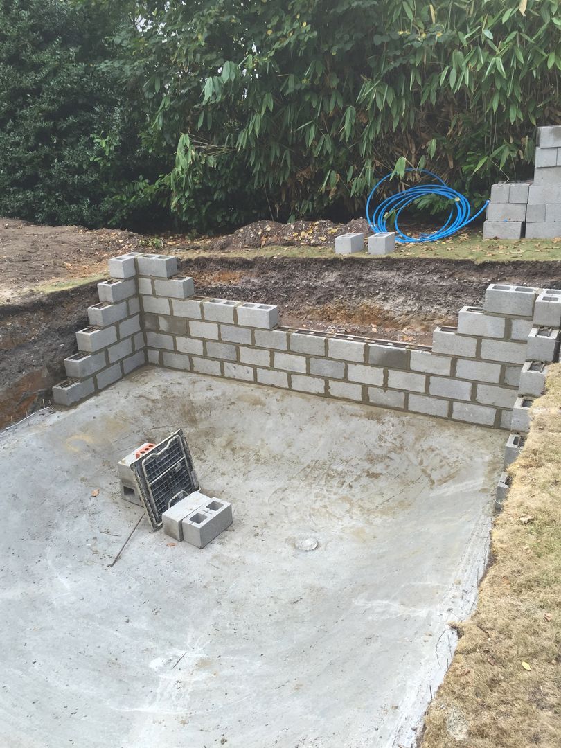 The UK Swimming pools team used concrete blocks to build the sides of the swimming pool