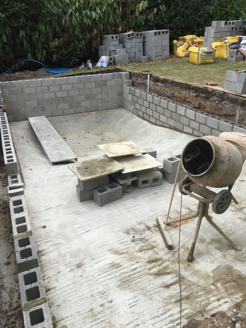 The UK Swimming pools team used concrete blocks to build the sides of the swimming pool