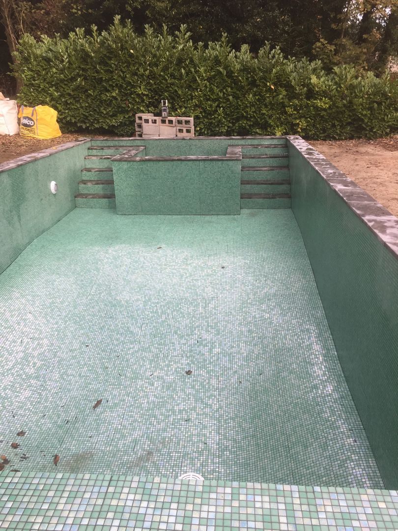 The entire swimming pool tiling has been finished