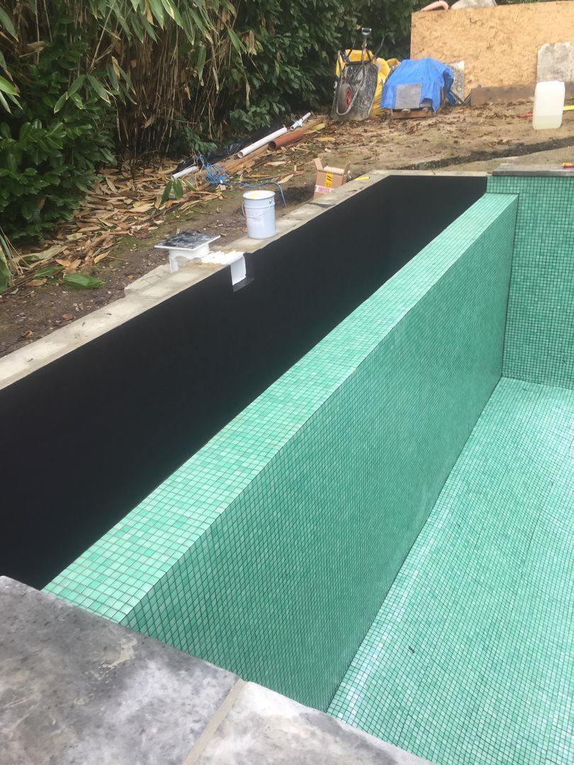 The entire swimming pool tiling has been finished