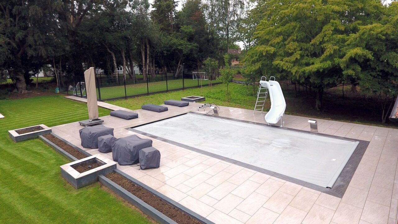 Finished shot of this Luxury Swimming Pool with the automatic pool cover