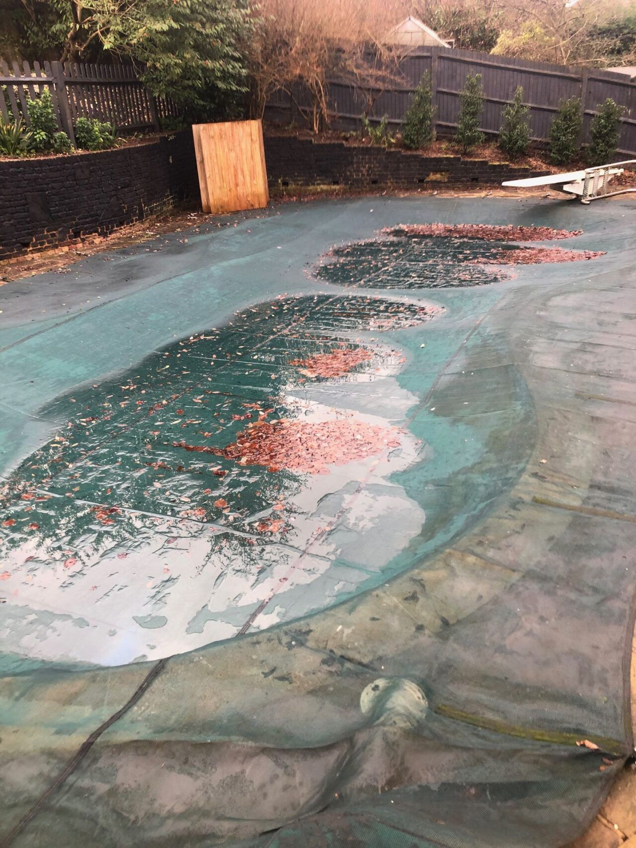 Renovation of an irregularly shaped residential swimming pool originally constructed in the 1970s Renovation of an irregularly shaped residential swimming pool originally constructed in the 1970s