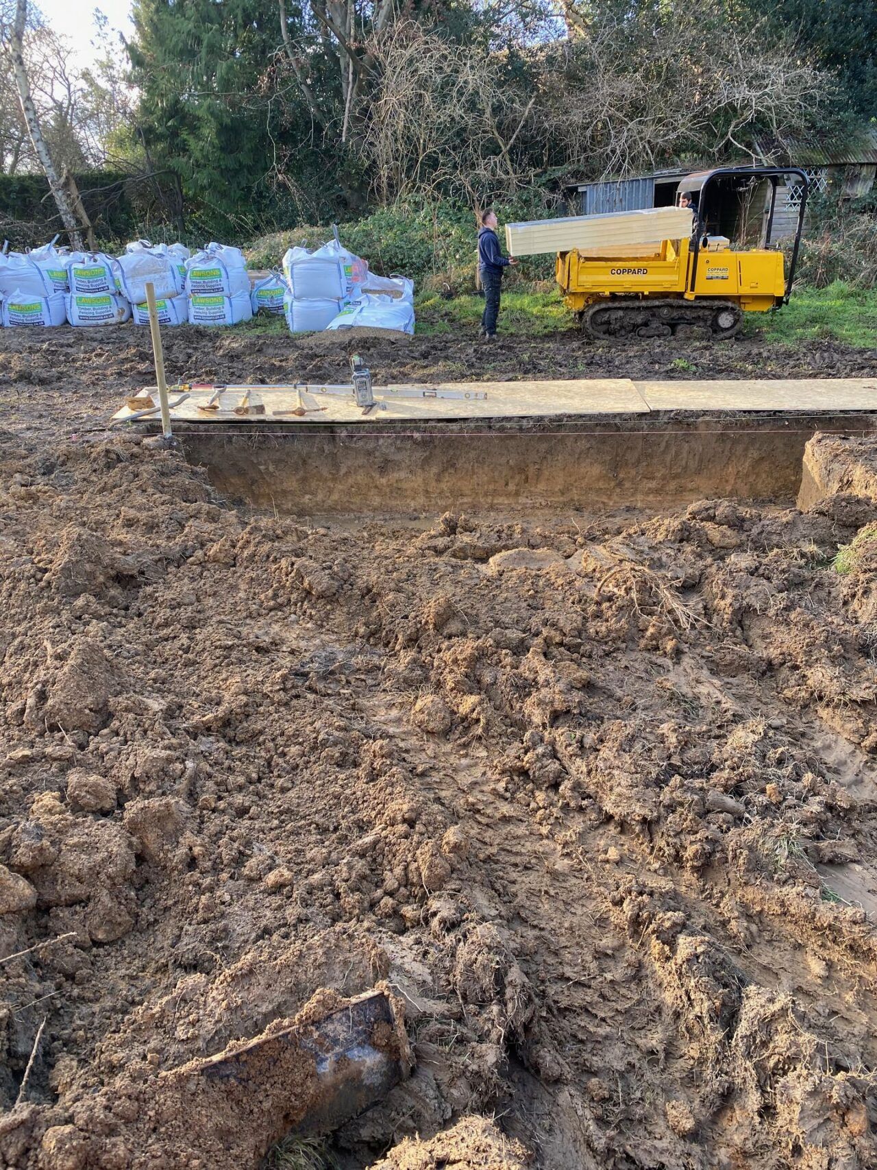 Removal of the mud and soil for the swimming pool