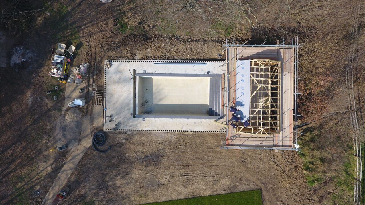 Top down view from a drone of the roofing of the pool house