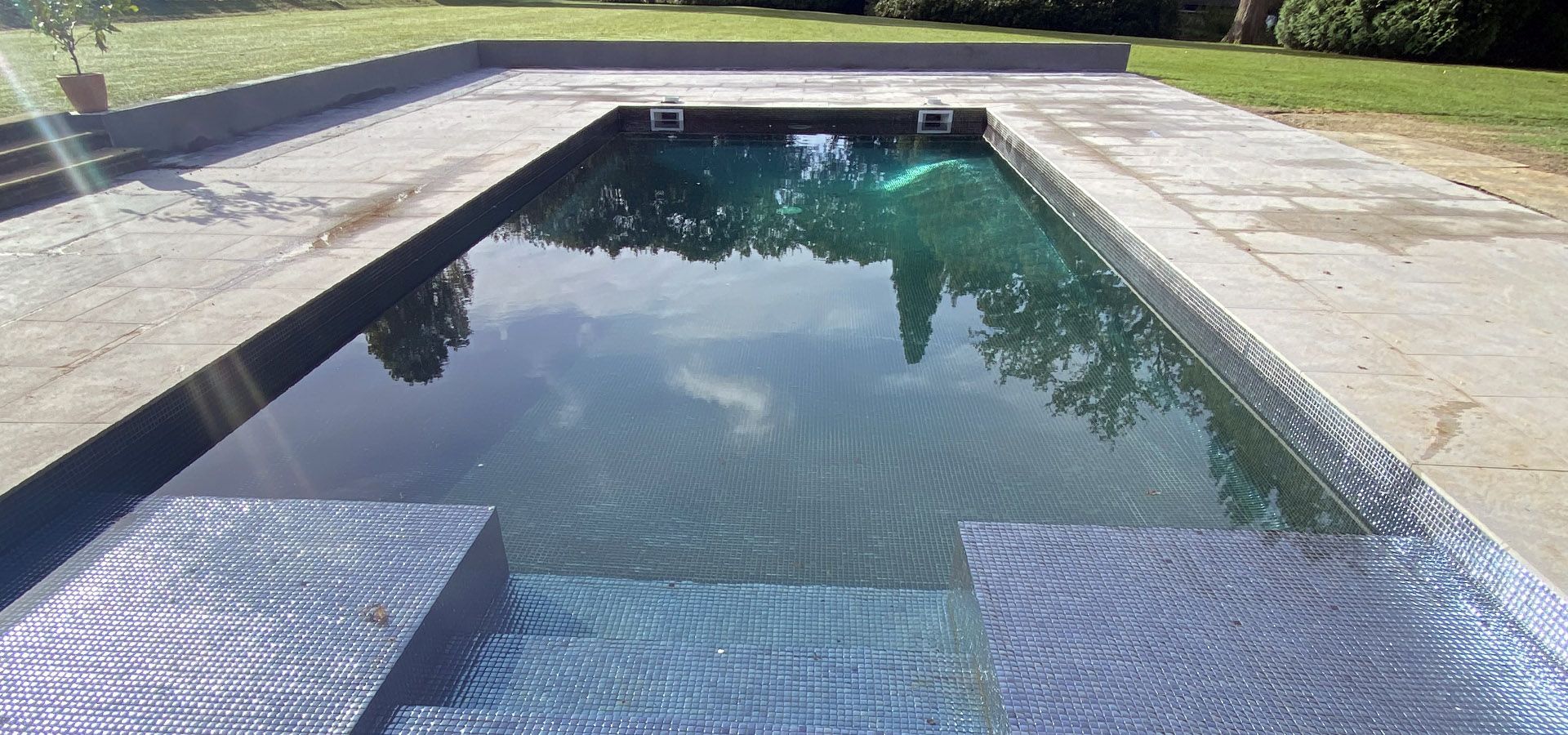 A finished view of the modern, streamlined design of the swimming pool