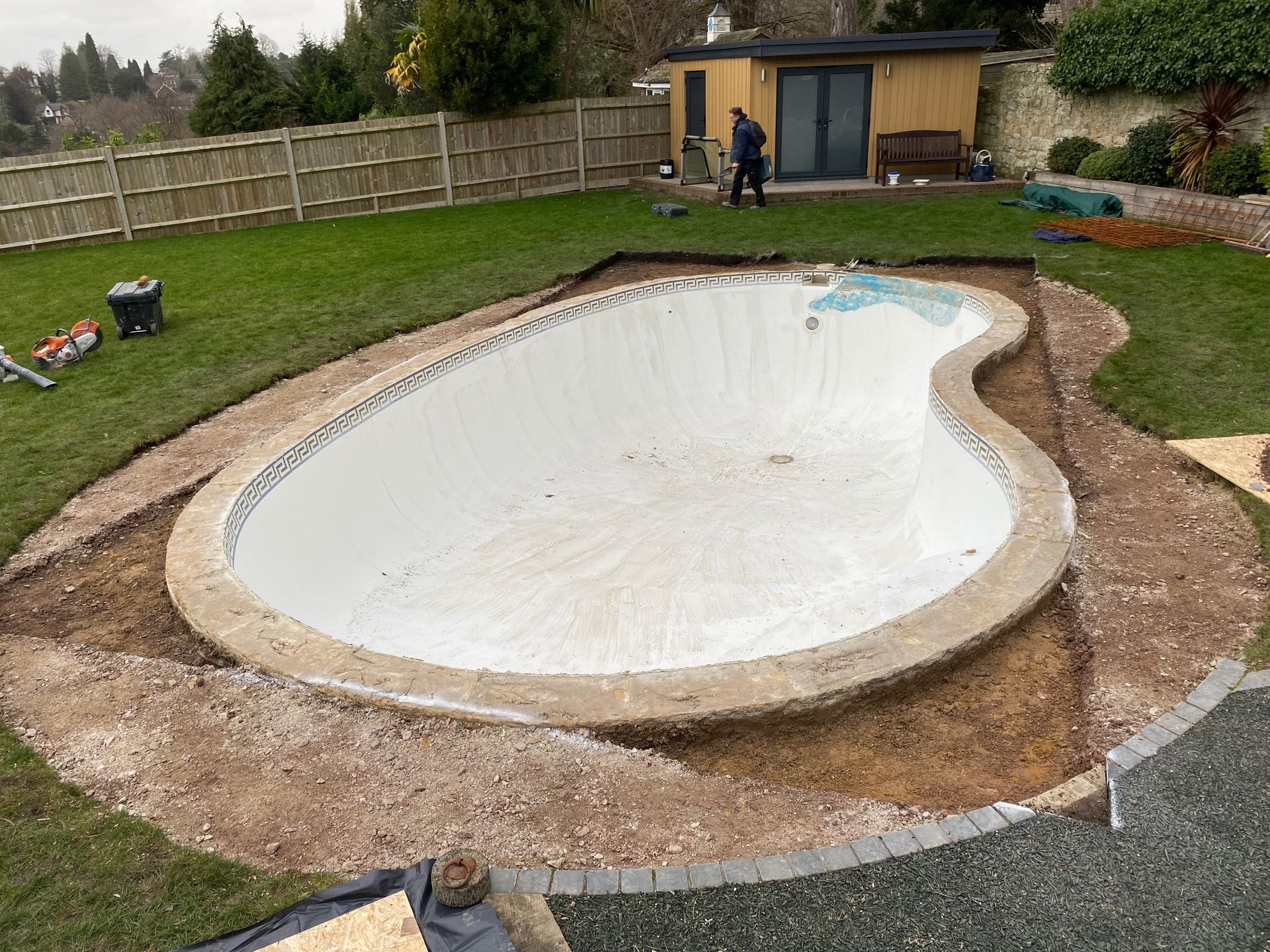 The Fiberglass interior was removed as well as the pavement around the swimming pool